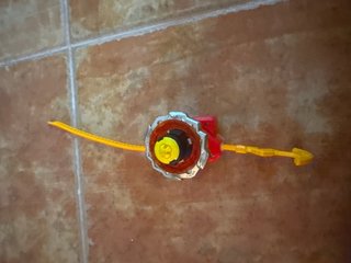 Beyblade con Lanzador