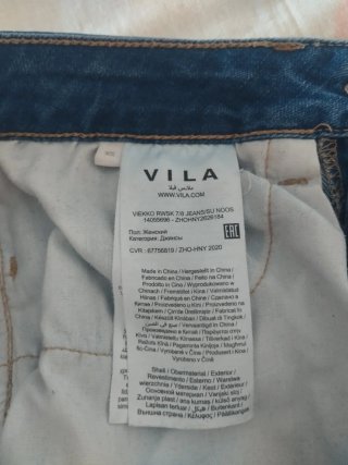Pantalón vaquero pitillo azul desgastado