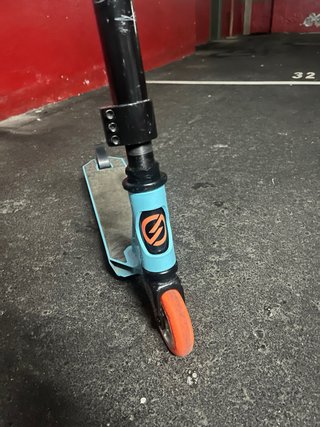 Patinete Scooter Oxelo azul y naranja