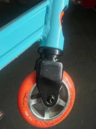 Patinete Scooter Oxelo azul y naranja