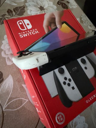 Nintendo Switch OLED + Agarres