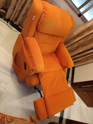 Sillón reclinable naranja de chenilla
