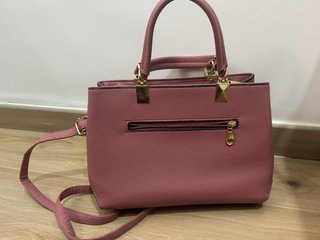 Bolso rosa con lazo y estrella