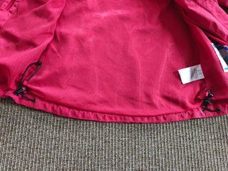 Chaqueta Trollkids impermeable rosa