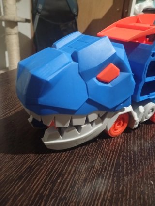 Dinosaurio Guarda Coches y Pista
