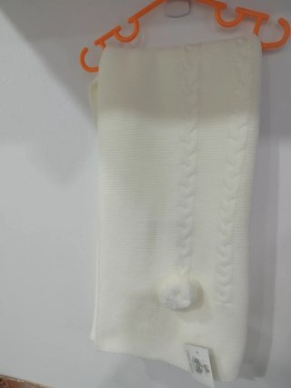Manta tejida cruda con diseño trenzado