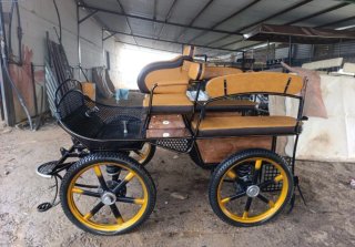 Coche de caballos con suspensión neumática