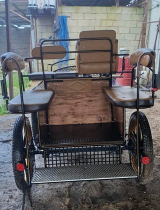 Coche de caballos con suspensión neumática