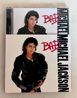CD PRECINTADO BAD + LIBRO LEGEND,MICHAEL JACKSON
