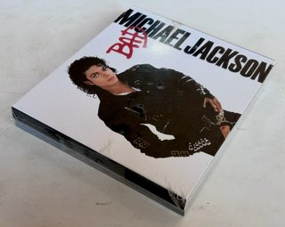 CD PRECINTADO BAD + LIBRO LEGEND,MICHAEL JACKSON