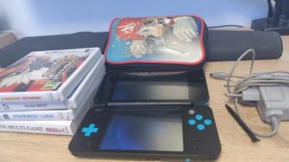 Pack Nintendo 2DS XL con funda y juegos