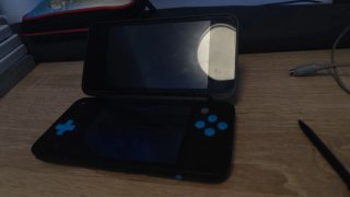 Pack Nintendo 2DS XL con funda y juegos