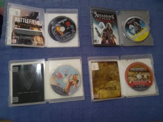 Consola PS3 Slim + Mando + 4 Juegos