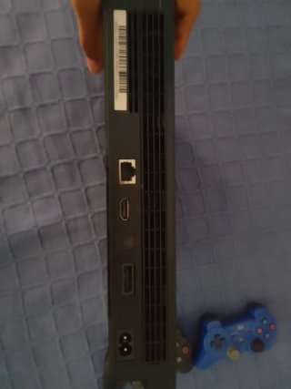 Consola PS3 Slim + Mando + 4 Juegos