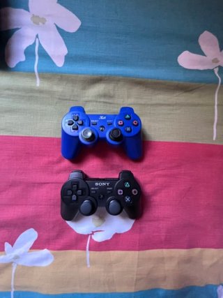 Consola PS3 Slim + 2 Mando + 4 Juegos