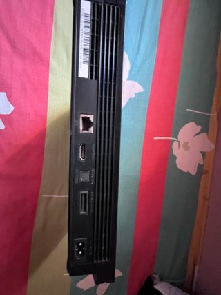 Consola PS3 Slim + 2 Mando + 4 Juegos