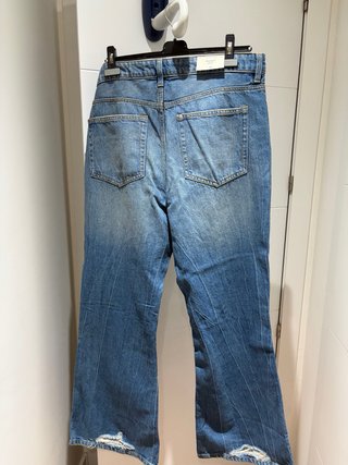 Pantalón vaquero mujer bootcut desgastado