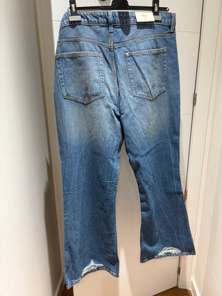 Pantalón vaquero mujer bootcut desgastado