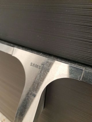 Televisión Curva Samsung Negra y Plateada