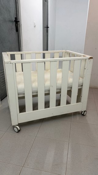 Mini cuna con ruedas