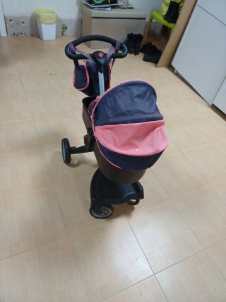 Carro de juguete para muñecas