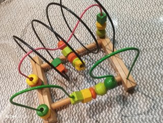 Laberinto de Cuentas de Madera