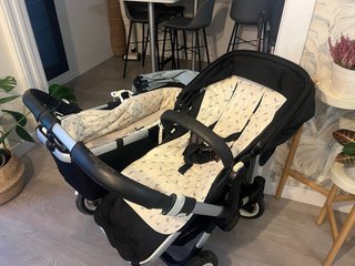 Carrito Bugaboo Doble. 2 sillitas y 2 capotas
