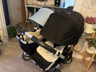 Carrito Bugaboo Doble. 2 sillitas y 2 capotas