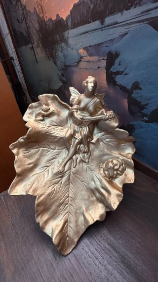 Peça decorativa folha de vide com anjo