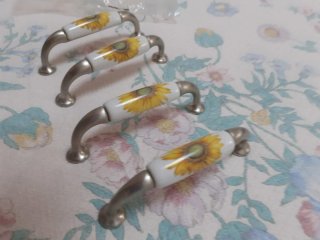 Maniglie ceramica girasole set 4