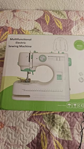 Máquina de coser eléctrica multifunción