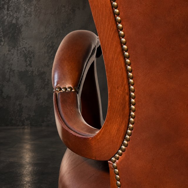 Sillón Valenti Piel Capitoné Madera
