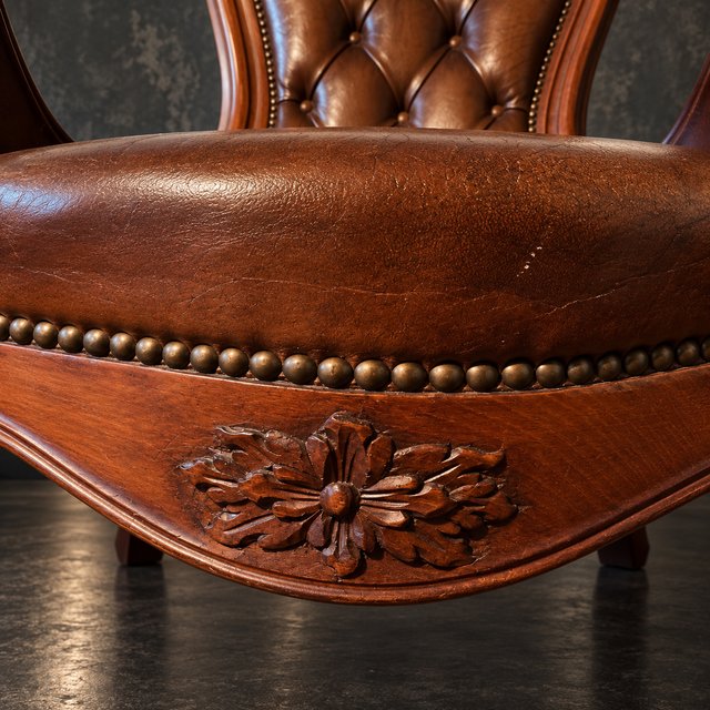 Sillón Valenti Piel Capitoné Madera