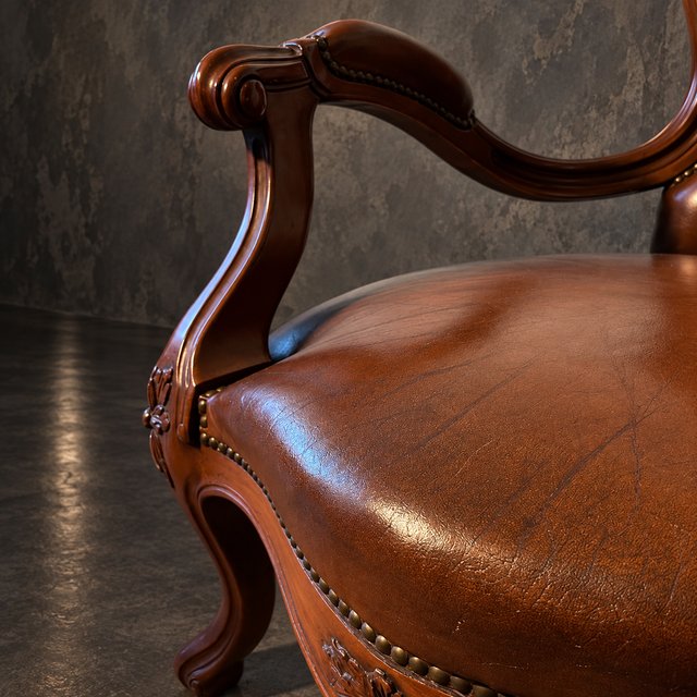 Sillón Valenti Piel Capitoné Madera