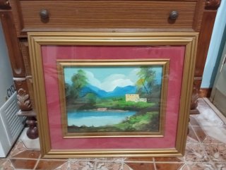 Quadro con cornice dorata