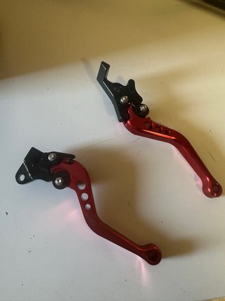 Manetas de moto rojas