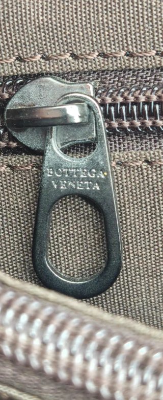 Pochette Bottega Veneta uomo in pelle intrecciata
