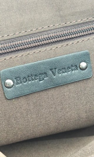 Pochette Bottega Veneta uomo in pelle intrecciata
