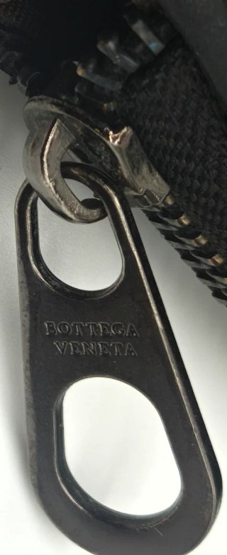 Pochette Bottega Veneta uomo in pelle intrecciata