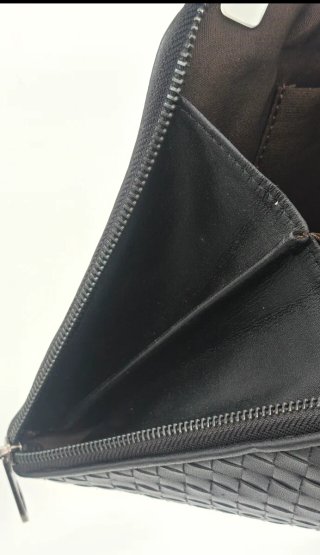 Pochette Bottega Veneta uomo in pelle intrecciata