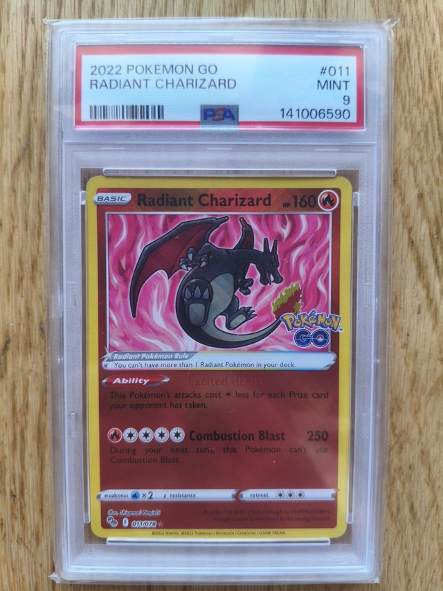 Carta Pokémon Radiant Charizard 011 PGO PSA 9