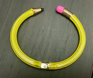 Pulsera estilo lapicero amarillo y dorado