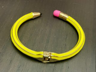 Pulsera estilo lapicero amarillo y dorado
