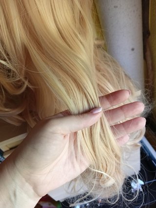 Peluca rubia con dos coletas