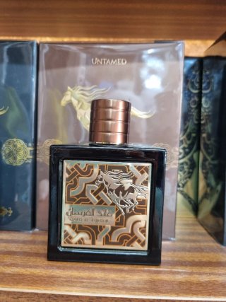 Perfume QAED AL FURSAN Marrón y Dorado