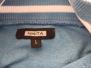 Chaqueta deportiva vintage 90s azul y blanca