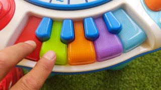 Mesa de actividades musicales y táctiles para bebé