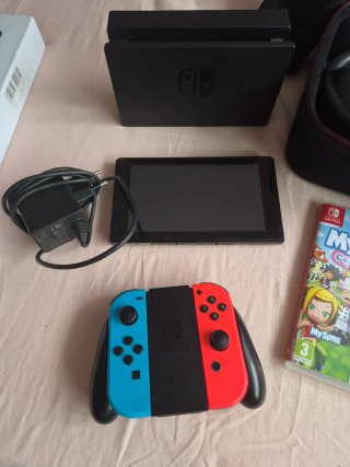 Nintendo Switch + Accesorios y Juegos