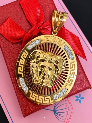 Colgante de oro Medusa con circonitas