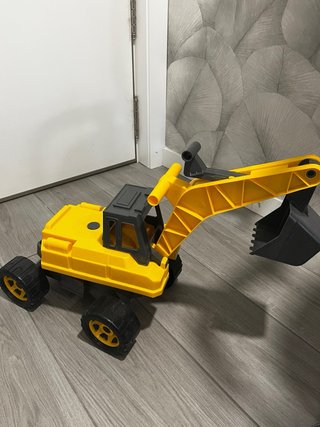 Excavadora de juguete amarilla para niños